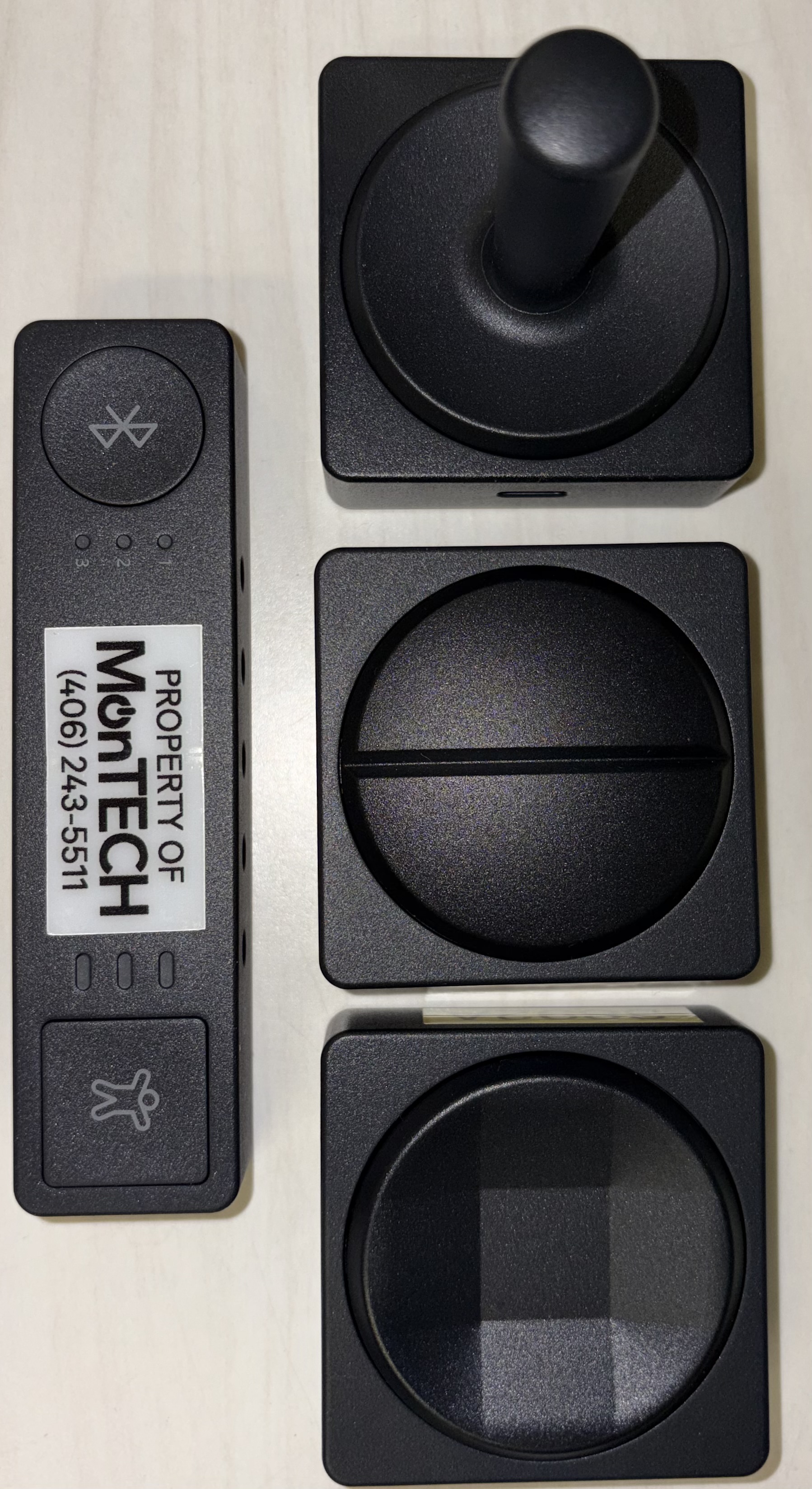 Thumbnail of Microsoft Adaptive Hub, Adaptive Dual Button, Adaptive Joystick Button, and Adaptive D-Pad Button.