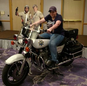 Shannon astride one of the motorcycles from the 70s TV cop drama CHiPs