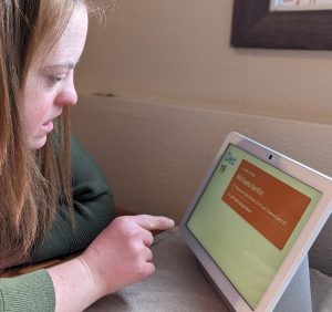 Michaela uses Hub to check her schedule. Screen shows a dentist appointment.