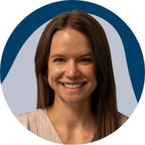 Headshot of Stephanie Fischer, a smiling woman with long straight dark hair.