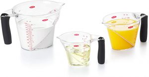 Clear, plastic pitcher-style measuring cups.