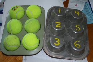 tennis balls and muffin tin